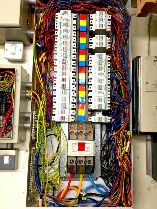 Commercial 3 phase consumer unit cover removed for testing
